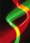 Light effect in two twisting beams, red, green and yellow.