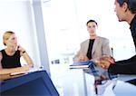 Business people sitting at desk