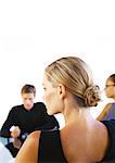 Business people sitting at table