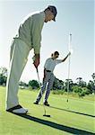 Mature man putting, woman holding flag