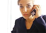 Businesswoman on cell phone, close up