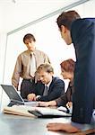 Business people working together at table