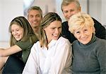 Five people grouped together, smiling, close-up, portrait