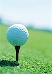 Golf ball on tee, close-up