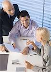 Business executives having discussion, high angle view