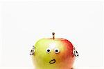 Apfel mit Googly Augen tragen Ohrringe