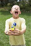 Boy Playing With Water Gun