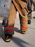 Firefighter Outside of Smoke-filled Building