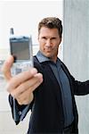 Man Taking Self Portrait with Camera Phone