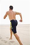 Man Running on Beach