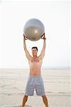 Man Holding Exercise Ball