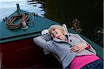 Woman Lying Down on Boat