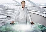 Portrait of Businesswoman Standing by Futuristic Table