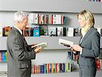 Businesspeople Reading Book