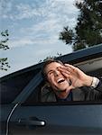 Businessman Shouting from Car