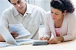 Couple sorting out home finances