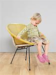 Little Girl Sitting on Chair