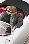 Couple Sitting in 1959, Porsche Speedster