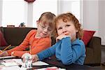 Girls Sitting at Coffee Table