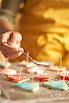 Woman Icing Cookies