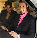 Portrait of Couple Sitting in Limousine