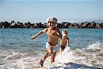 Boys Running on Beach