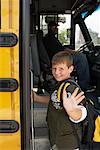 Boy Boarding School Bus