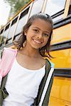 Girl by School Bus