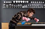 Man Cleaning Stove