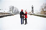 Couple Walking in Snow