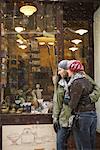 Couple Looking into Store Window