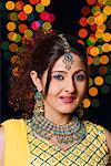 Portrait of a young woman wearing traditional Indian clothing and smiling