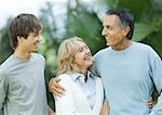 Mature couple with teen grandson