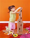 Girl Making Cardboard Tower
