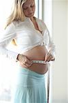 Enceinte femme mesure estomac