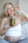Pregnant Woman Eating Pickles