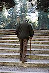 Man Walking up Stairs