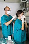 Dentists Putting Masks On