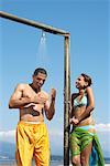 Couple Showering at Beach