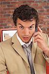 Businessman Using Telephone