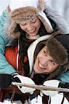 Portrait of Couple on Sled