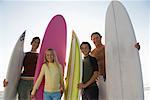 Portrait of Family with Surfboards