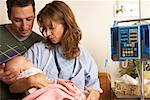 Parents with Baby in Hospital