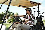 Man in Golf Cart