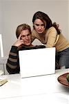 Couple Using Laptop Computer