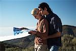 Couple Hiking, Looking at Map