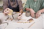 Man and Woman in Pottery Studio