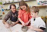 Family in Pottery Studio