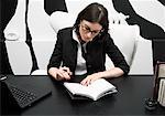 Businesswoman Working at Desk