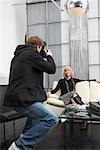 Photographer Taking Picture of Businesswoman